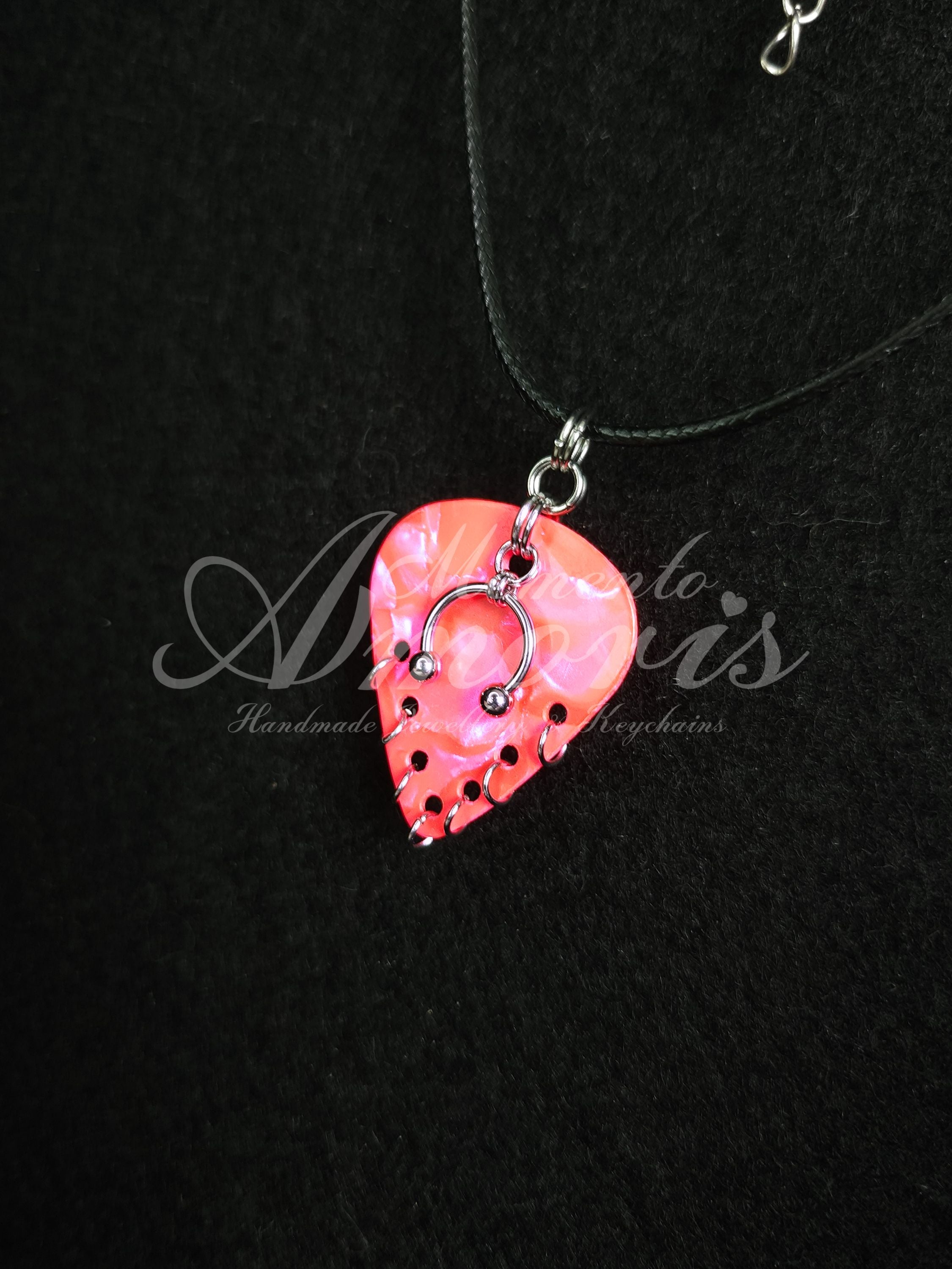 Plectrum Necklace 'Pierced x7' in pink, silver