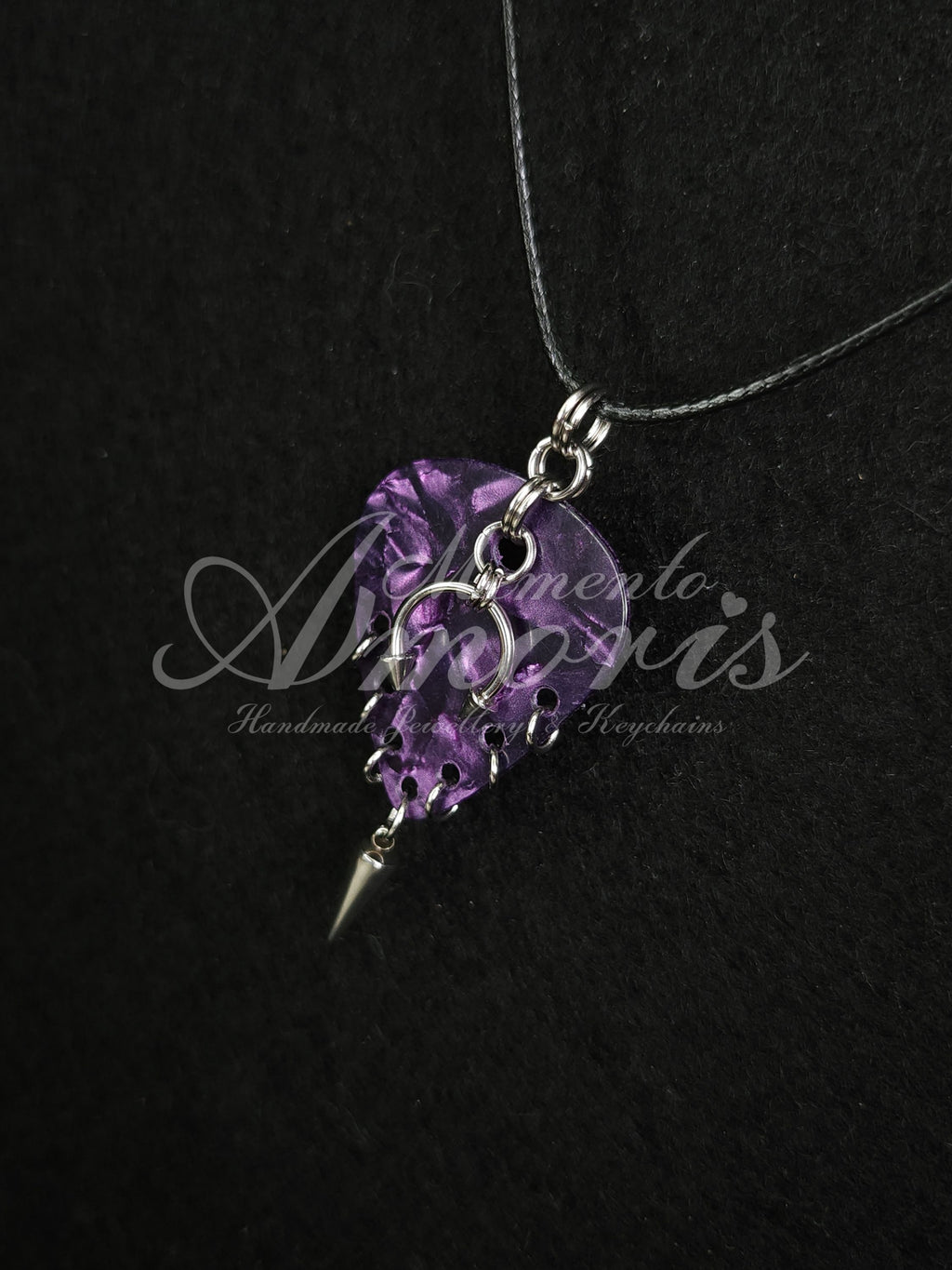 Plectrum Necklace 'Pierced and spiked' in purple, silver