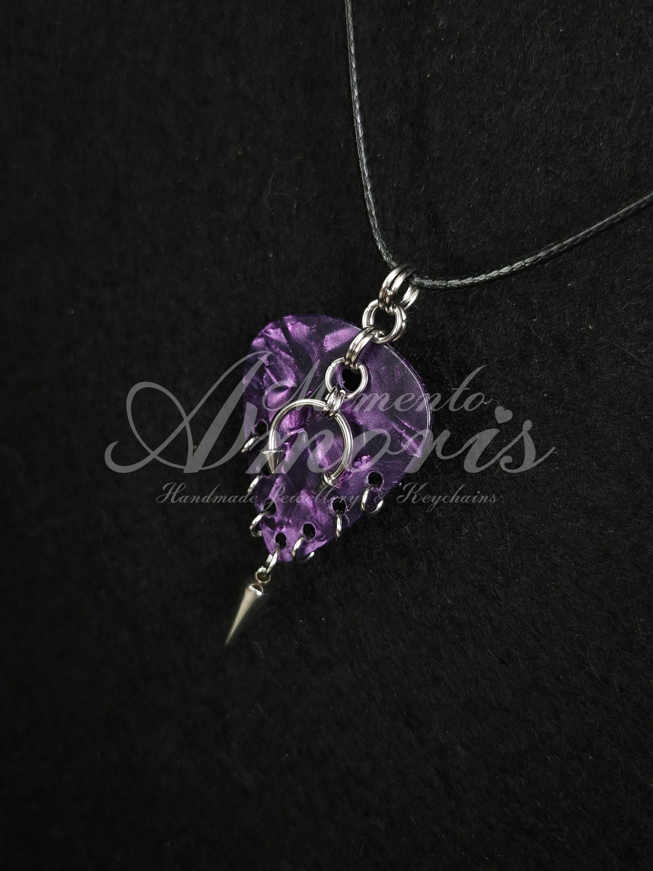 Plectrum Necklace 'Pierced and spiked' in purple, silver