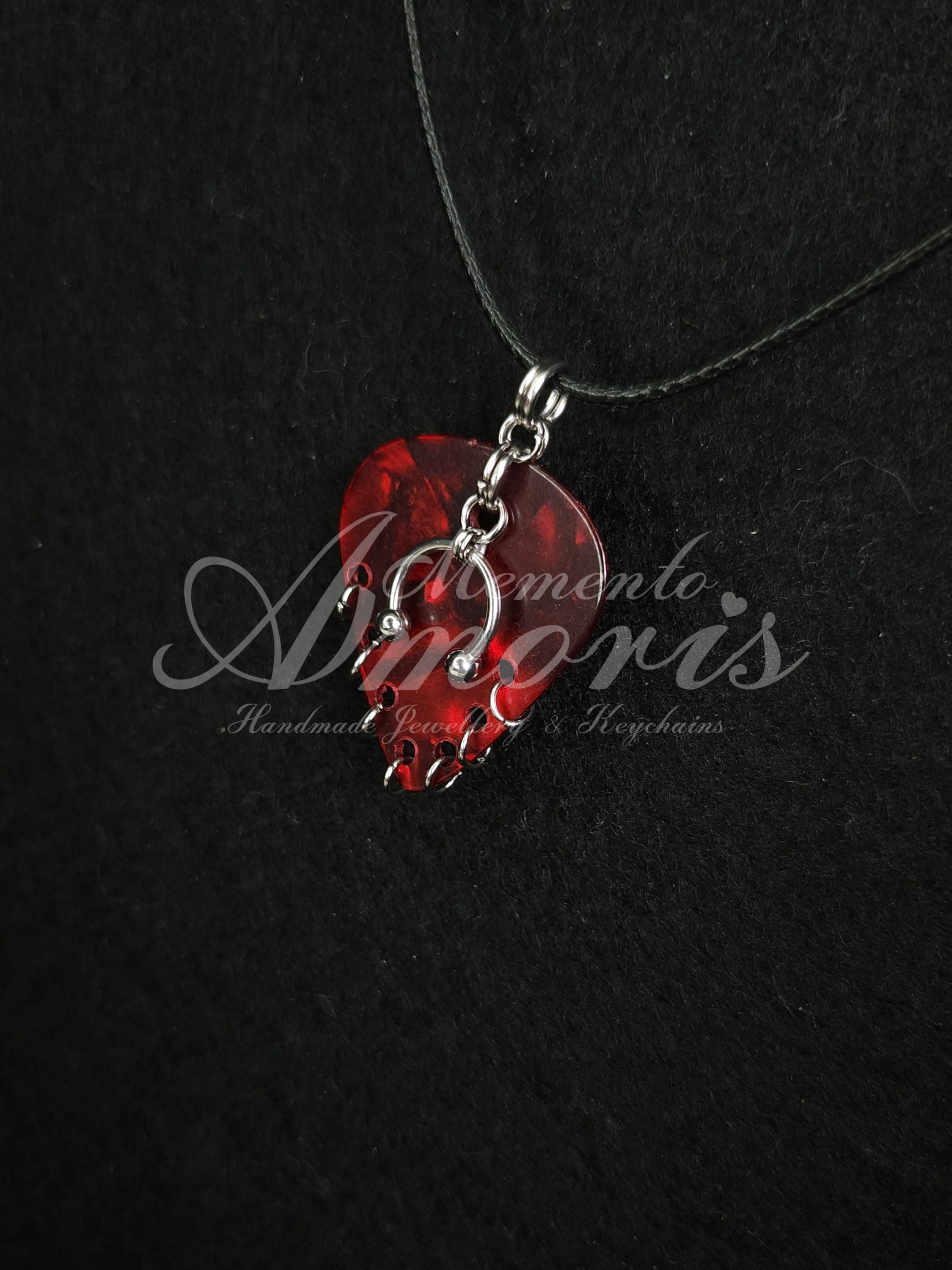Plectrum Necklace 'Pierced x7' in red, silver