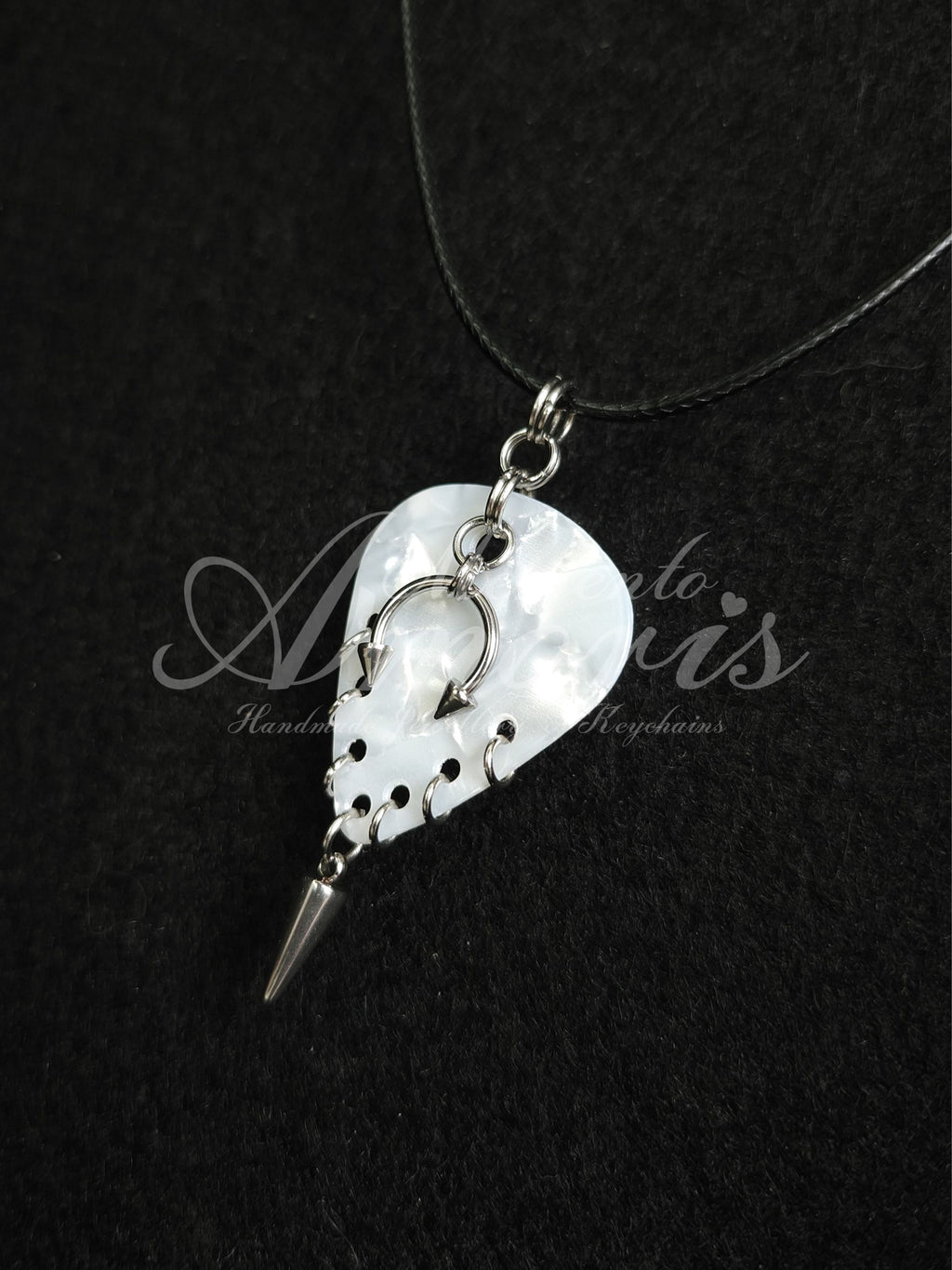 Plectrum Necklace 'Pierced and spiked' in white, silver