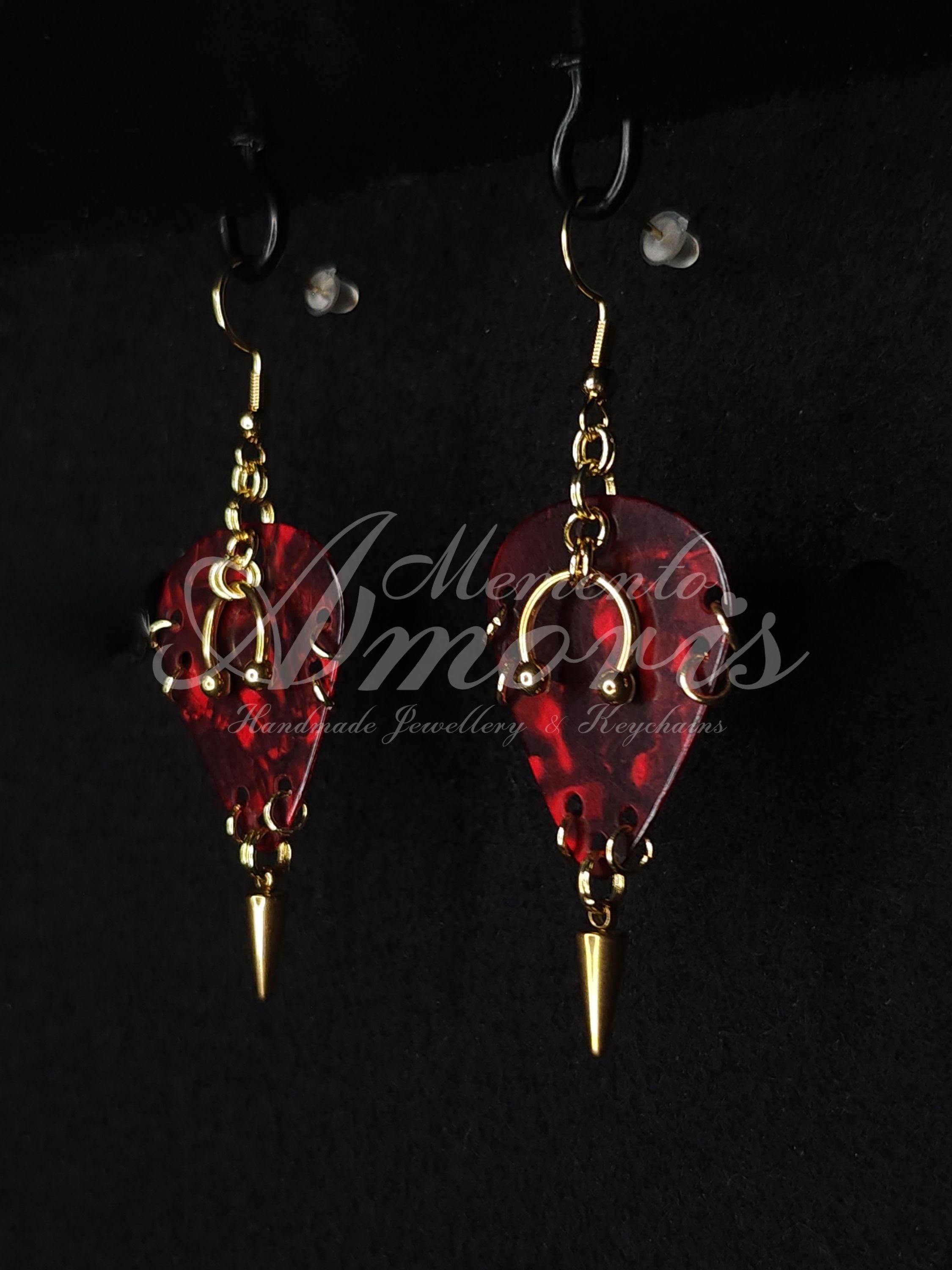 Plectrum Earrings 'Pierced and spiked' in red, gold