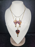 Photosphere Plectrum Set in gold