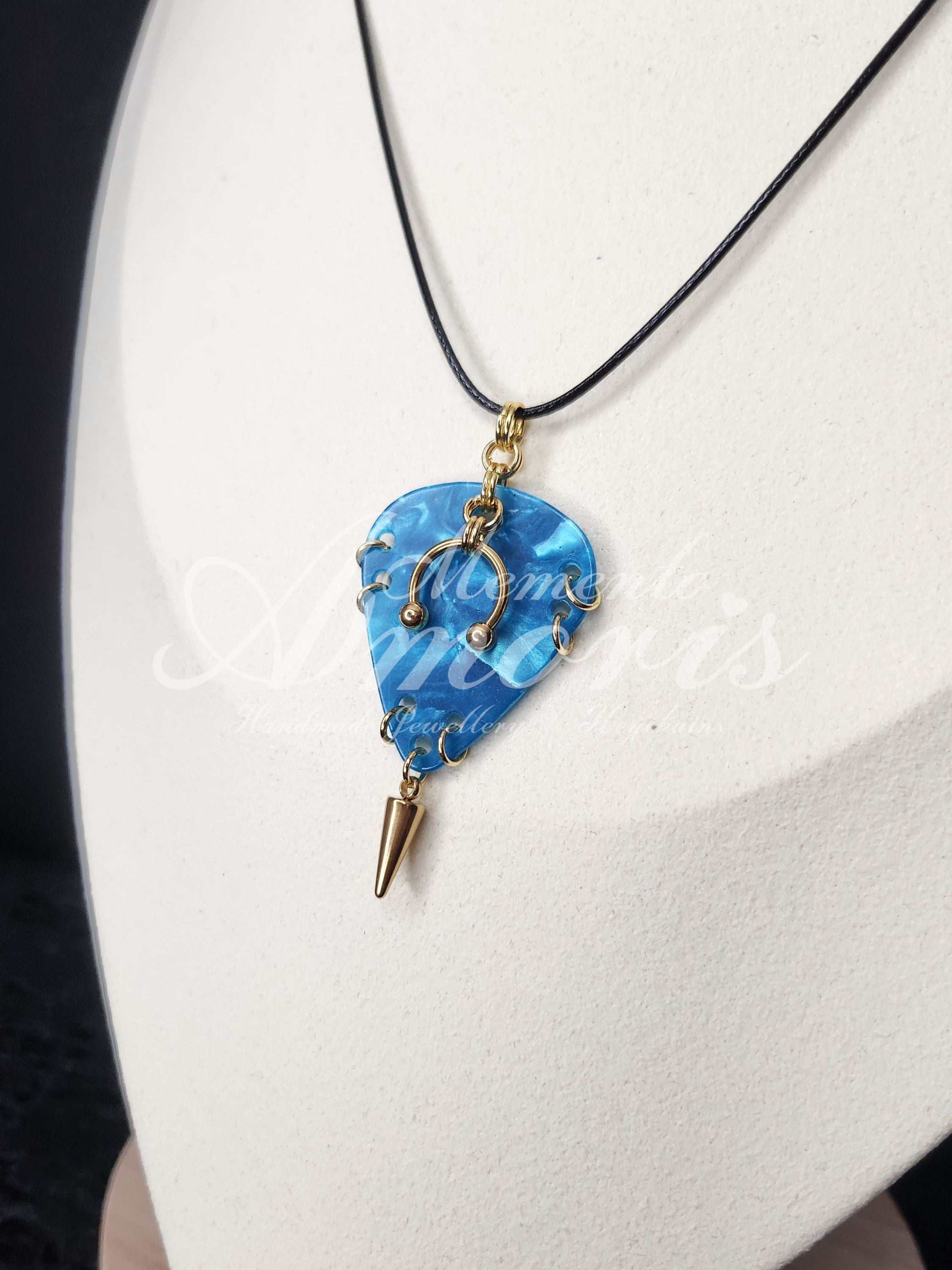 Plectrum Necklace 'Pierced and spiked' in blue, gold