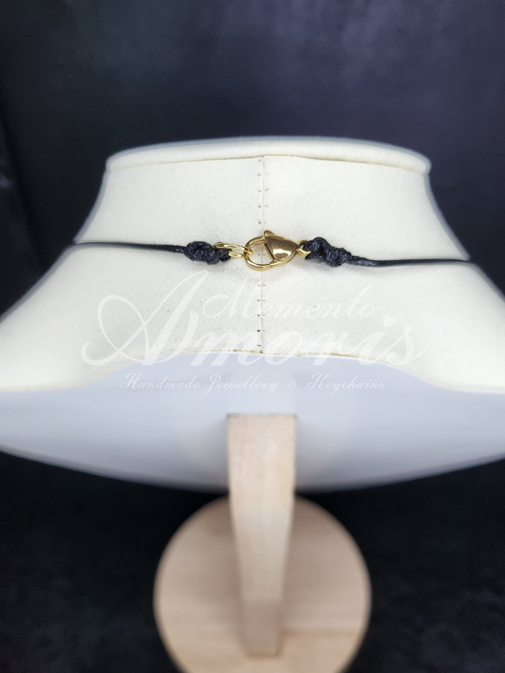 Plectrum Necklace 'Pierced and spiked' in purple, gold