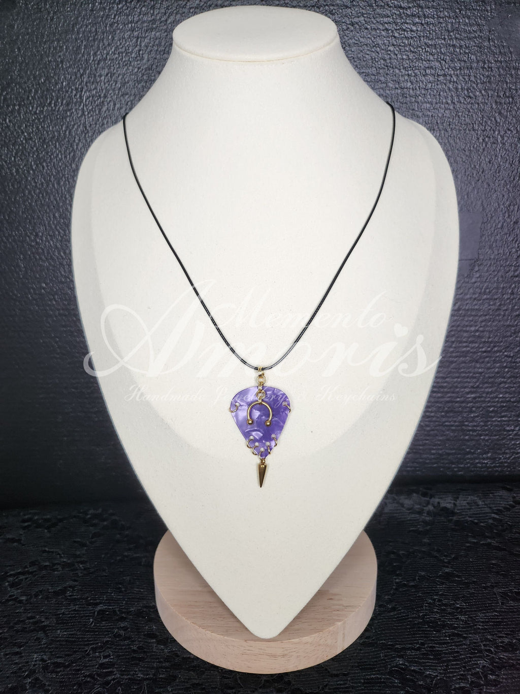 Plectrum Necklace 'Pierced and spiked' in purple, gold