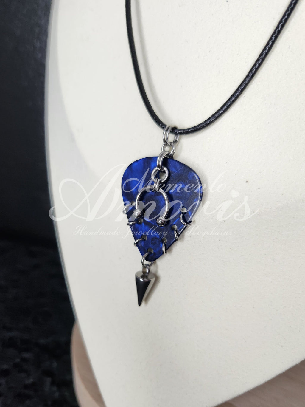 Plectrum Necklace 'Pierced and spiked' in dark blue, silver