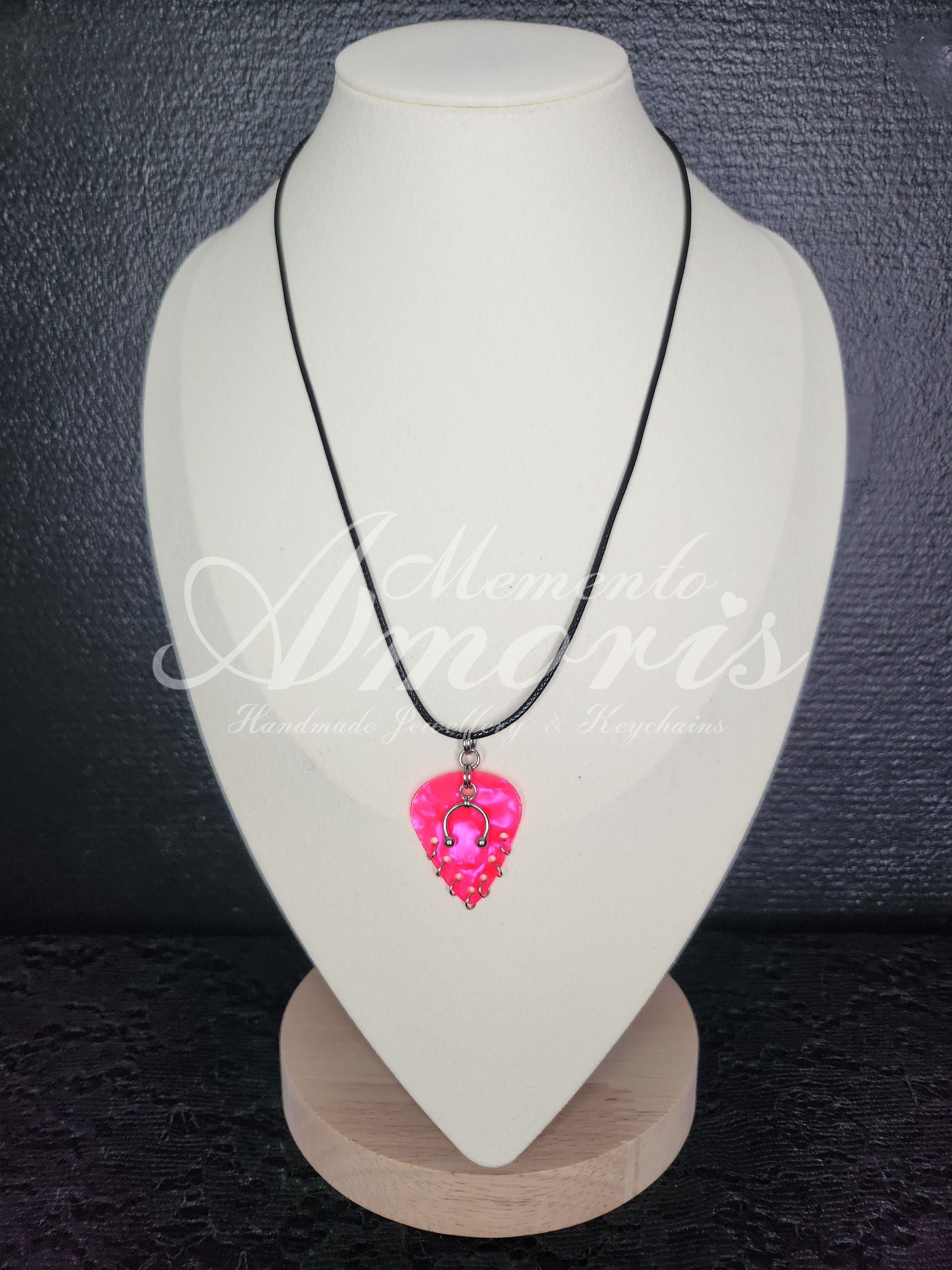 Plectrum Necklace 'Pierced x7' in pink, silver