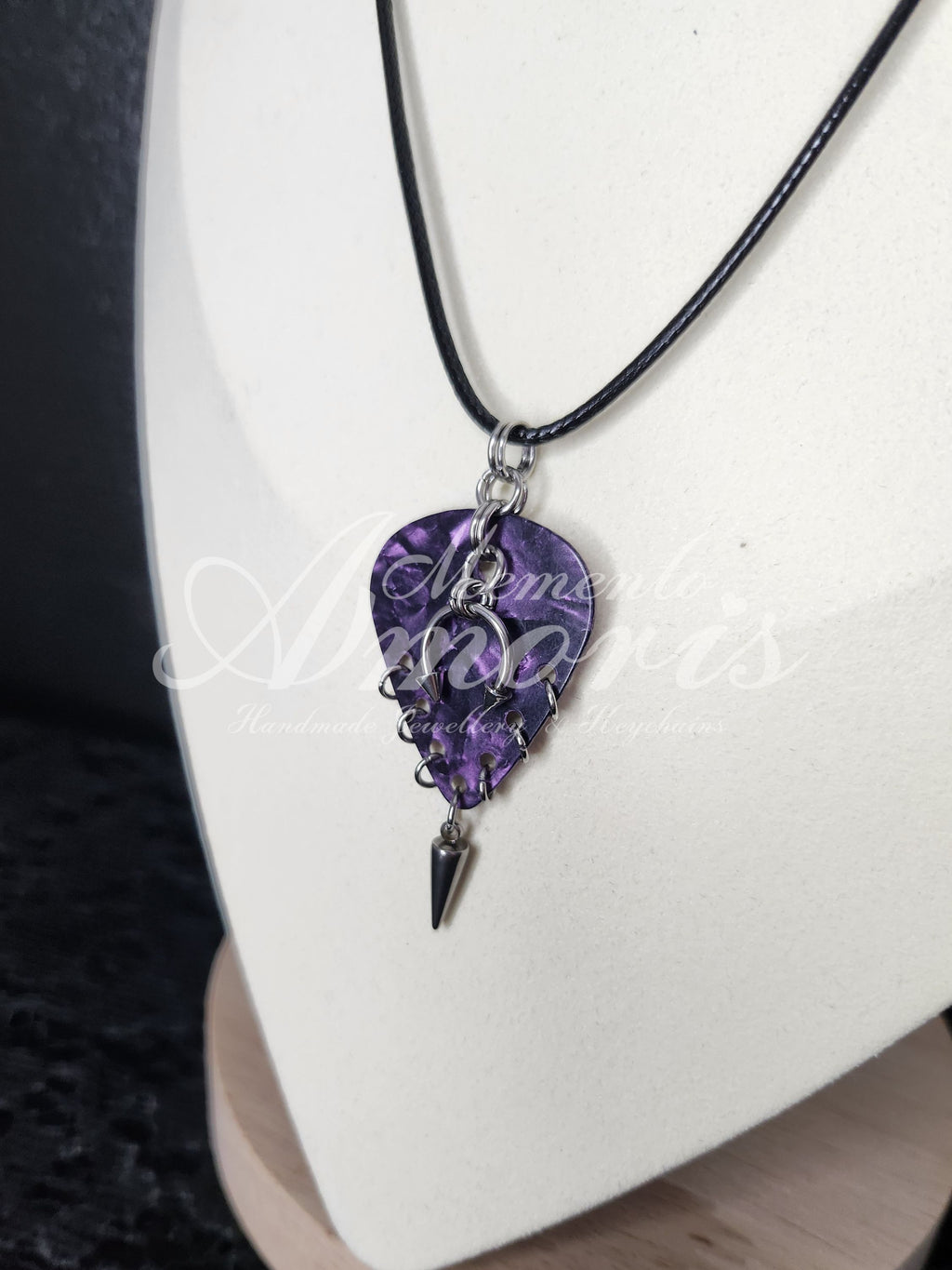 Plectrum Necklace 'Pierced and spiked' in purple, silver