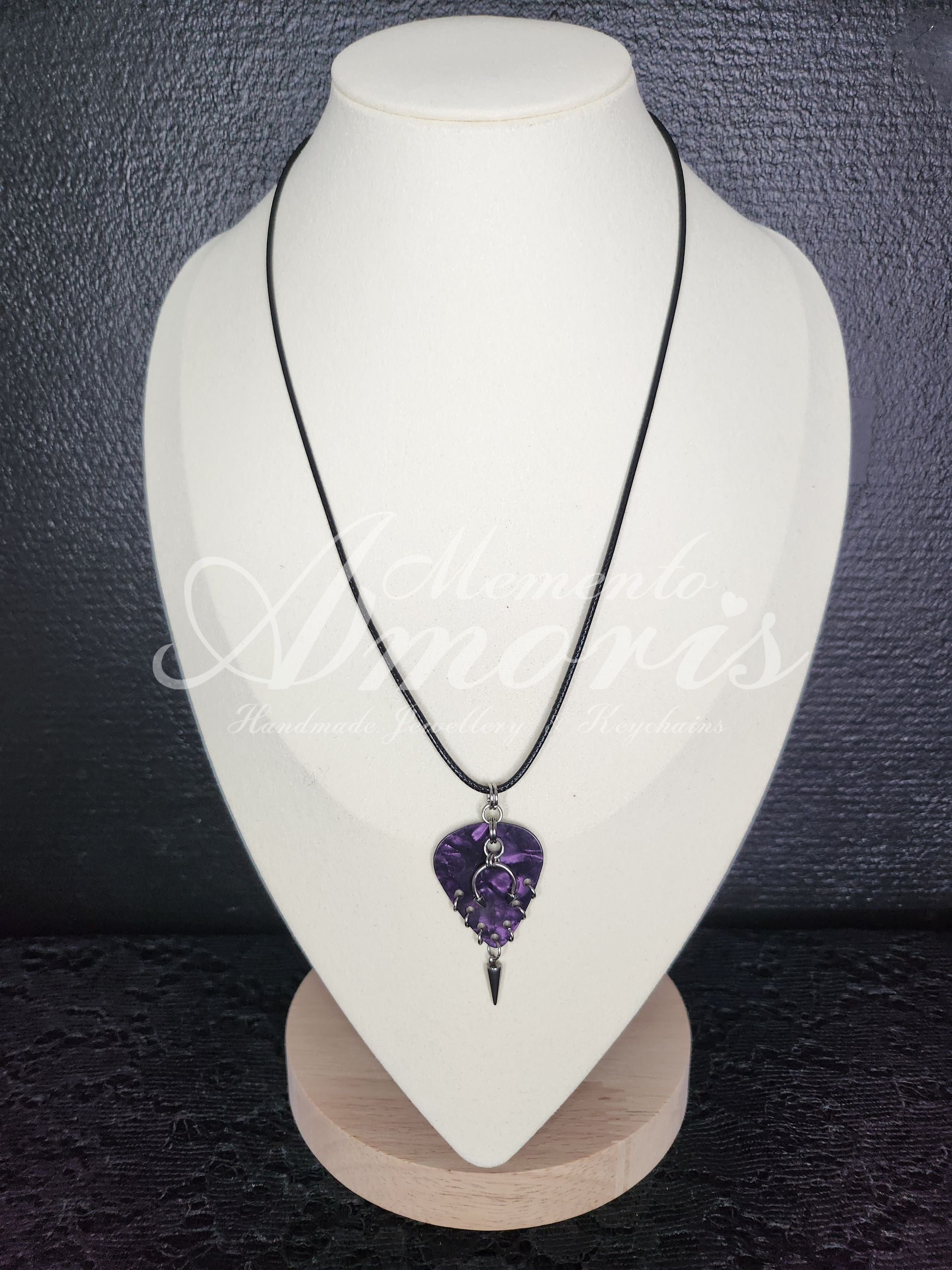 Plectrum Necklace 'Pierced and spiked' in purple, silver