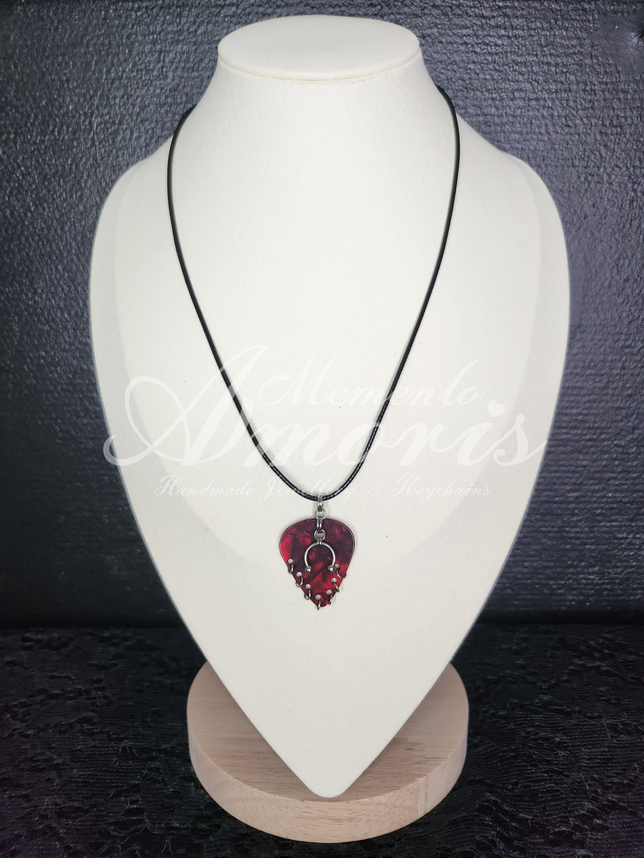 Plectrum Necklace 'Pierced x7' in red, silver