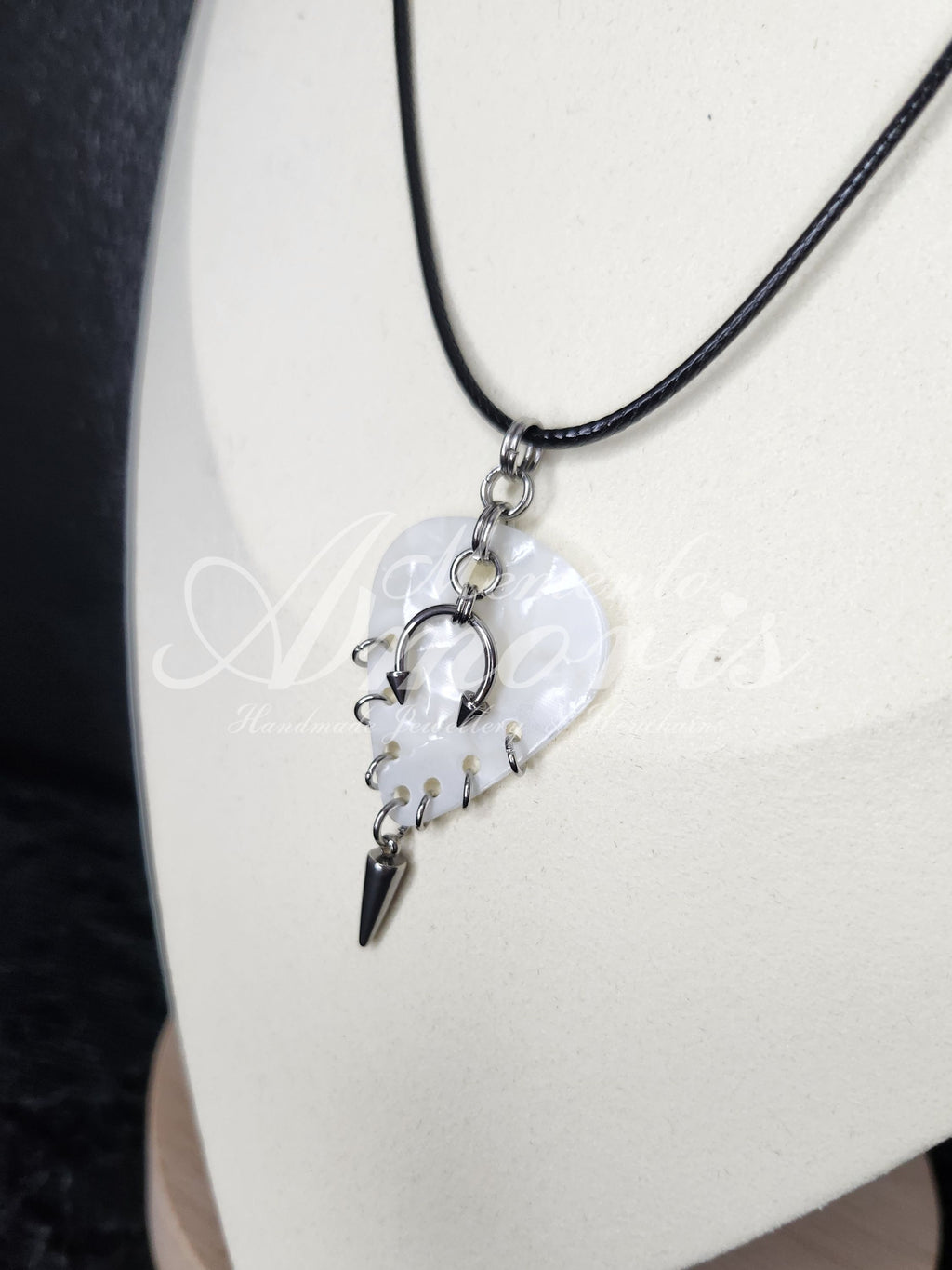 Plectrum Necklace 'Pierced and spiked' in white, silver
