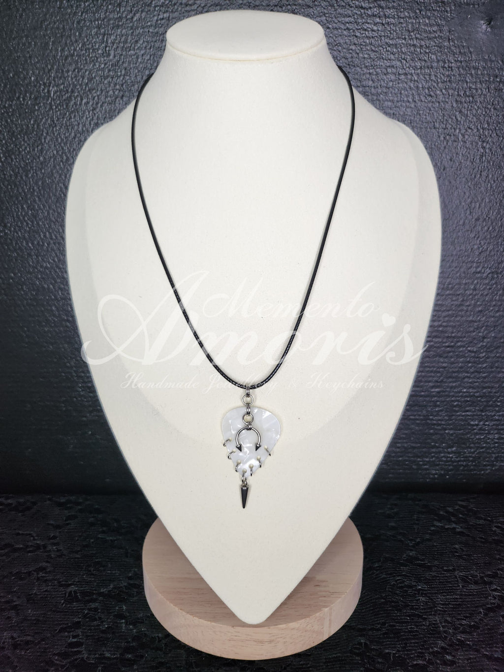 Plectrum Necklace 'Pierced and spiked' in white, silver