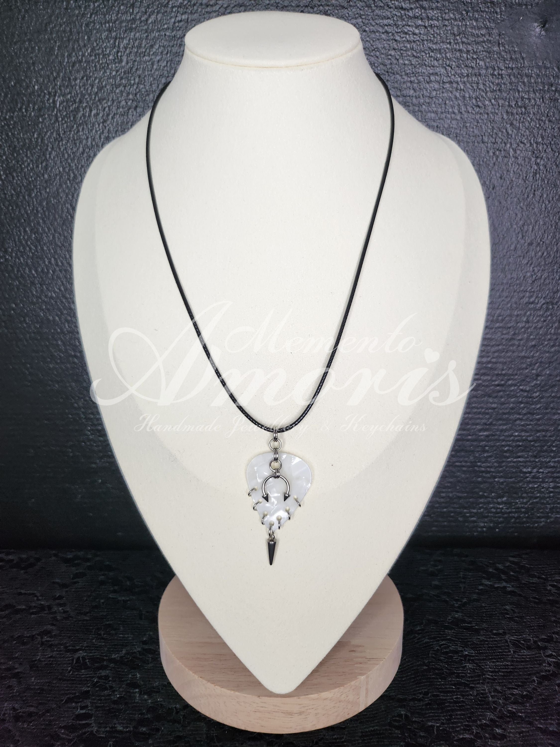 Plectrum Necklace 'Pierced and spiked' in white, silver