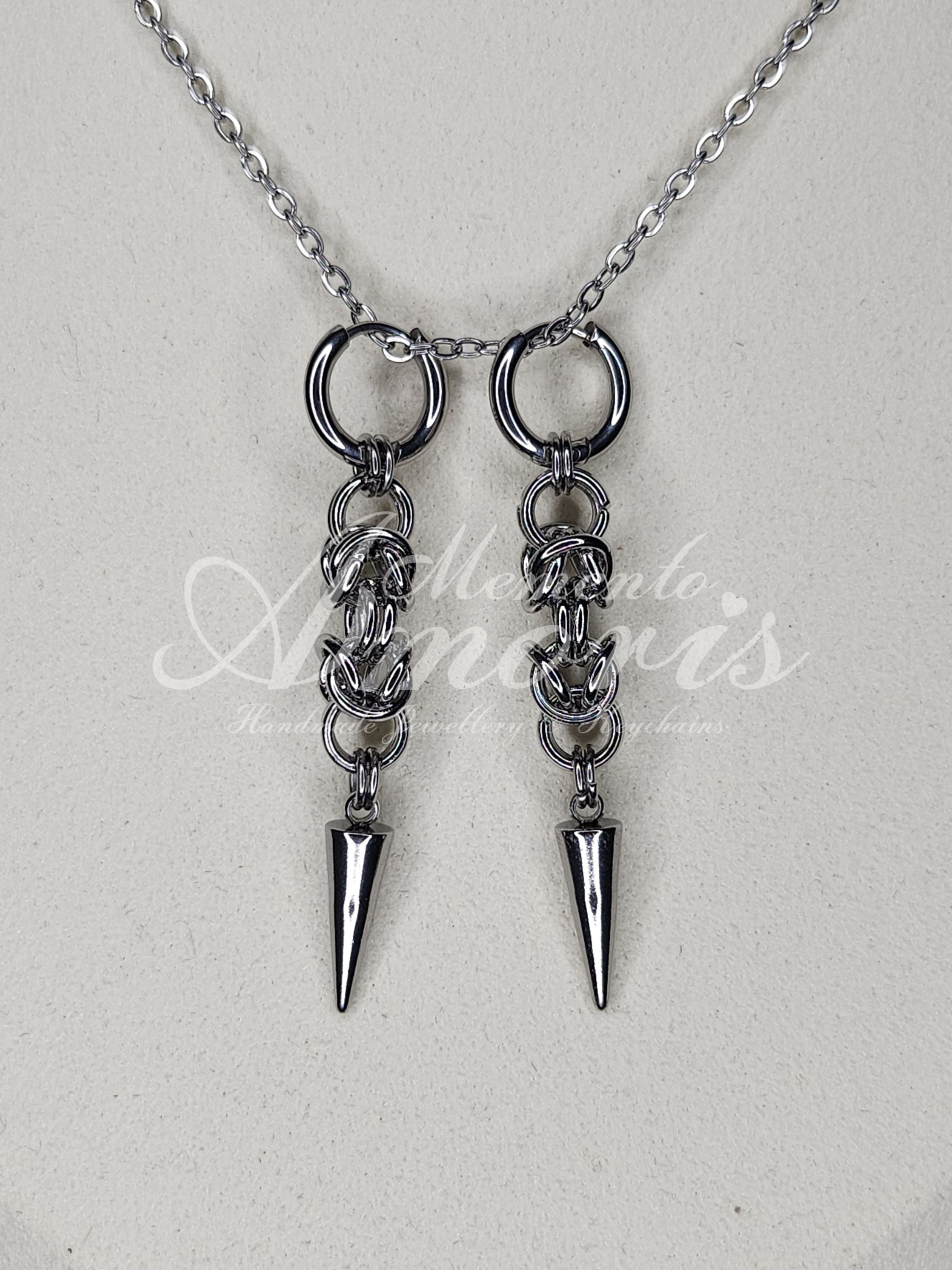 Knotted Spike Earrings in silver