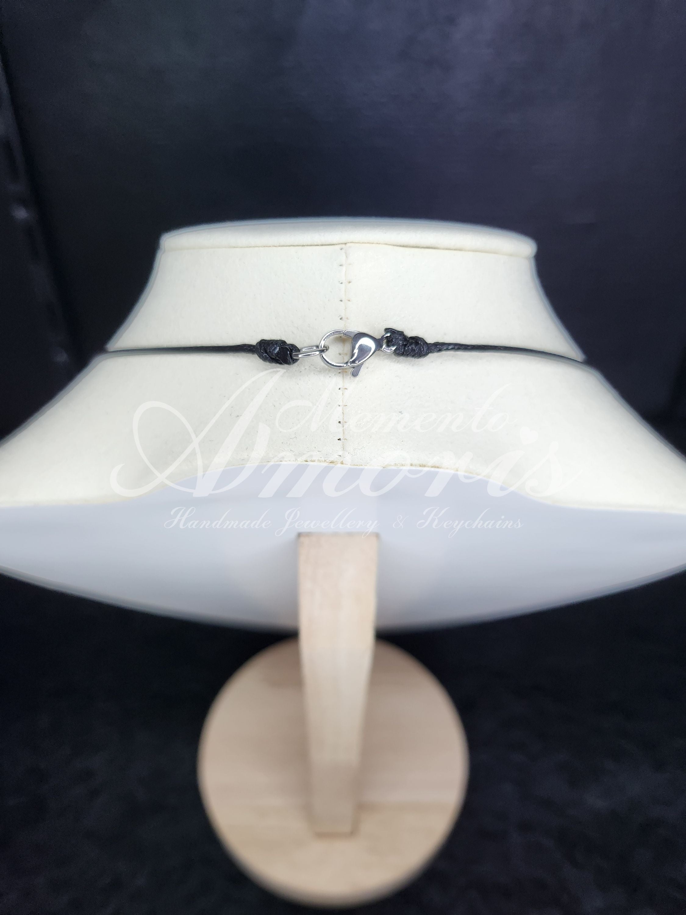 Plectrum Necklace 'Pierced and spiked' in white, silver