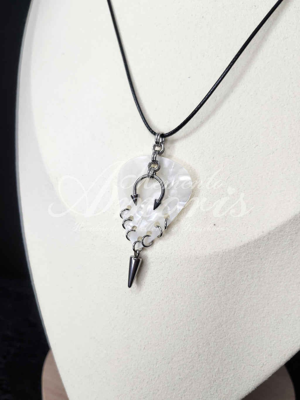 Plectrum Necklace 'Pierced and spiked' in white, silver