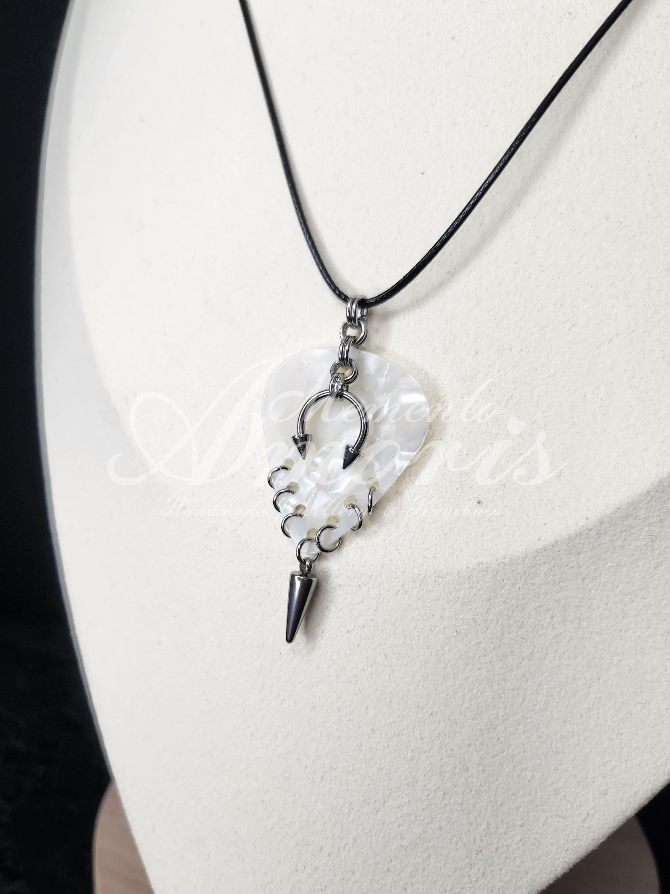 Plectrum Necklace 'Pierced and spiked' in white, silver