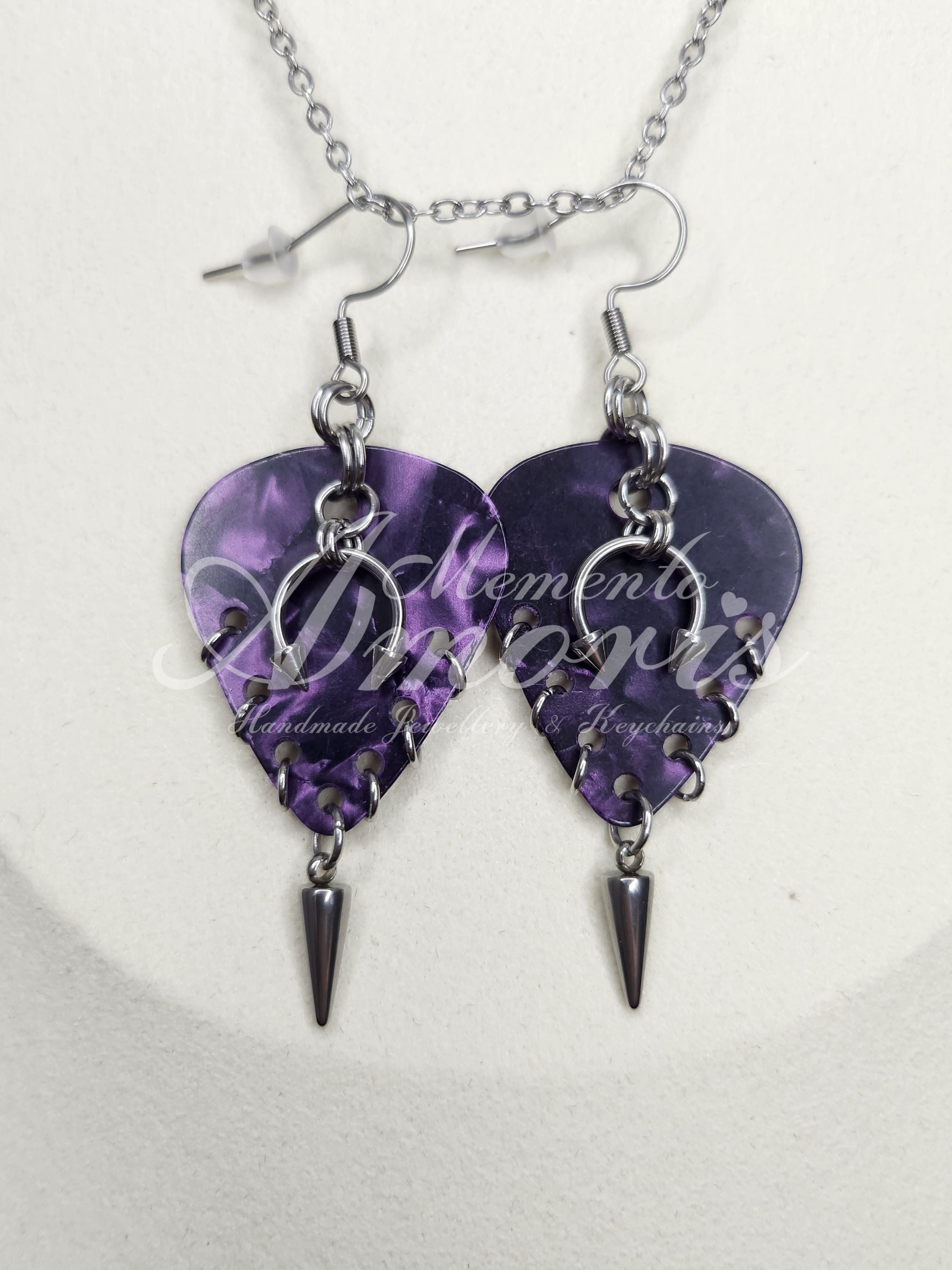 Plectrum Earrings 'Pierced and spiked' in purple, silver