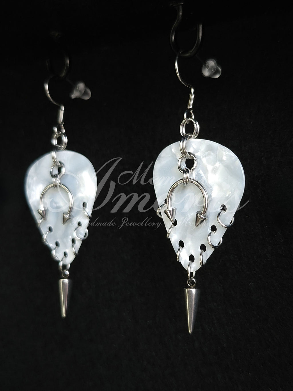 Plectrum Earrings 'Pierced and spiked' in white, silver