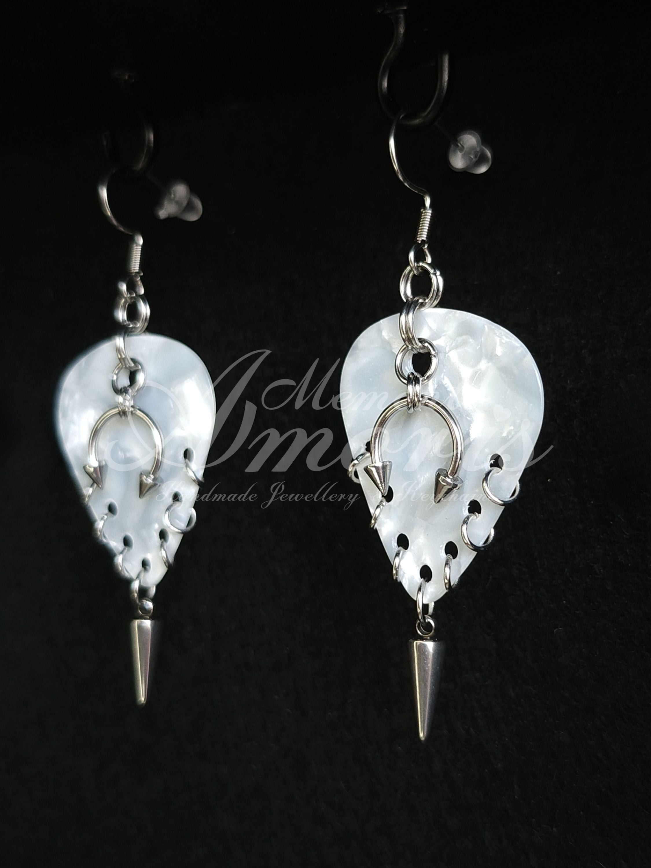 Plectrum Earrings 'Pierced and spiked' in white, silver