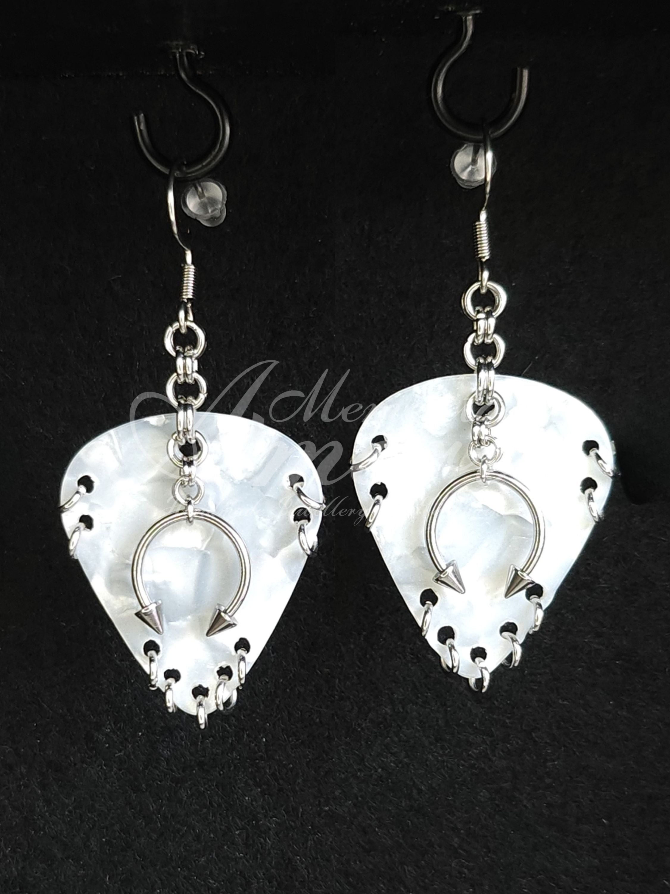 Plectrum Earrings 'Pierced x9' in white, silver