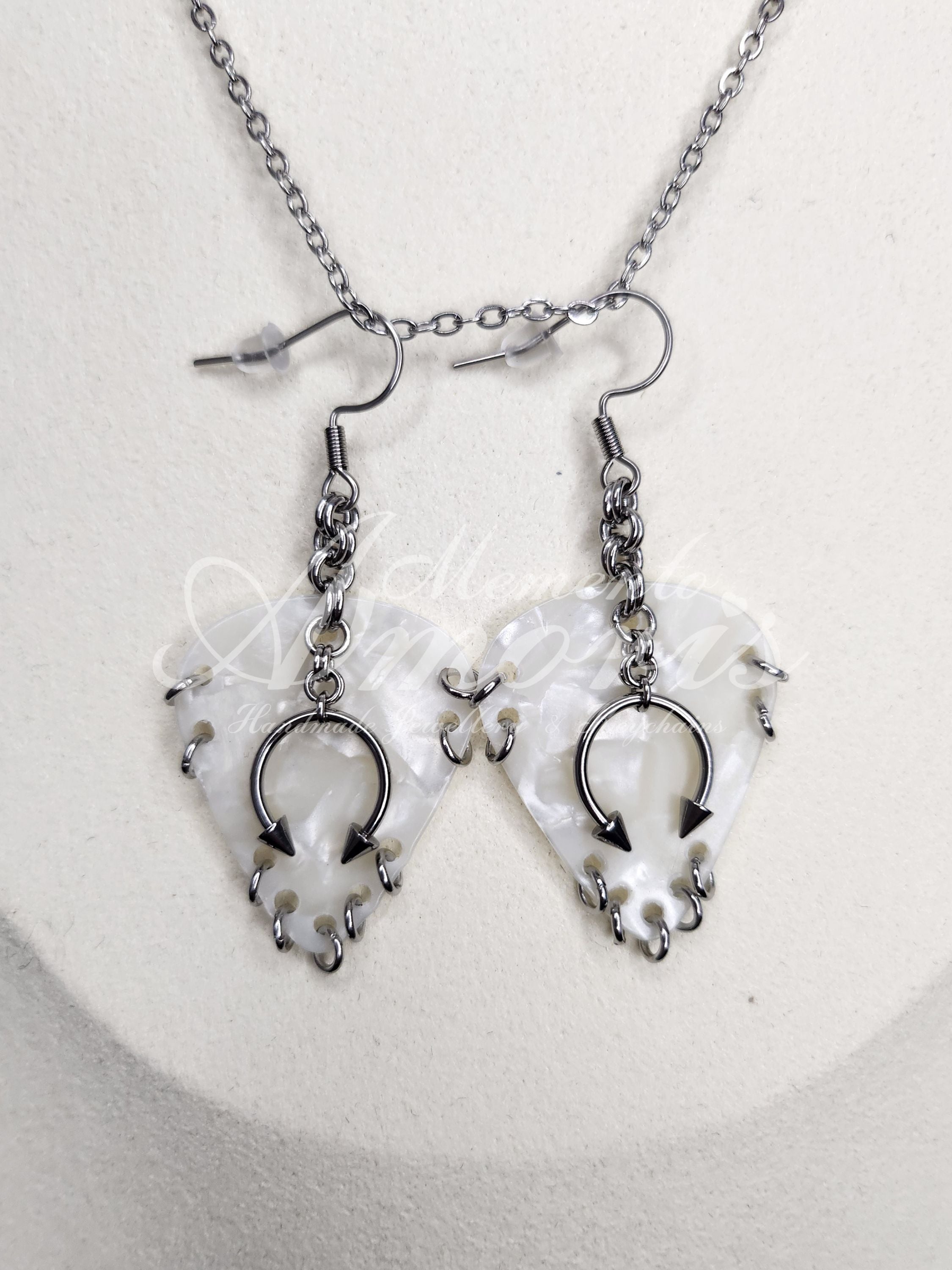 Plectrum Earrings 'Pierced x9' in white, silver