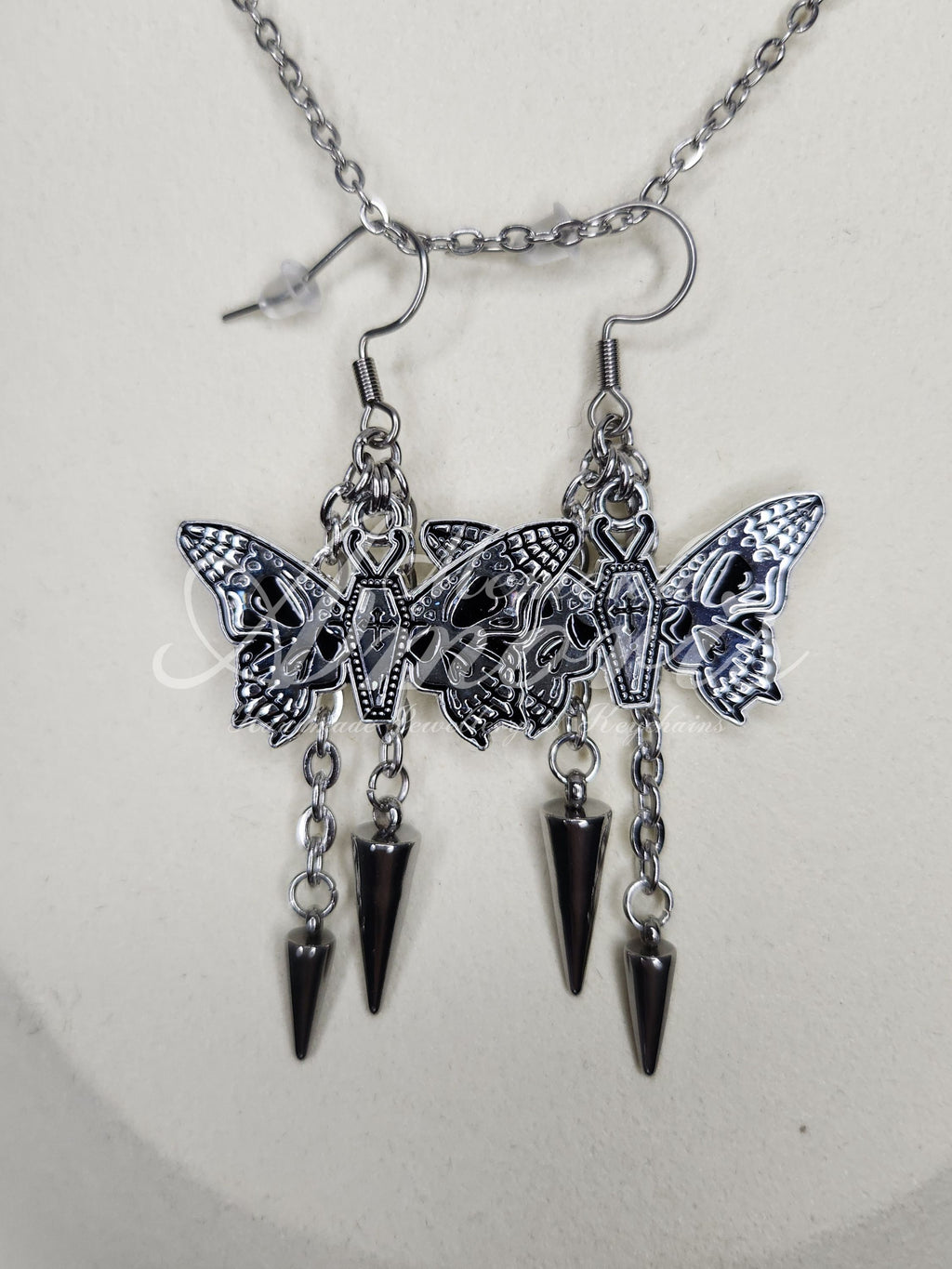 Spiked Coffin Butterfly Earrings in silver