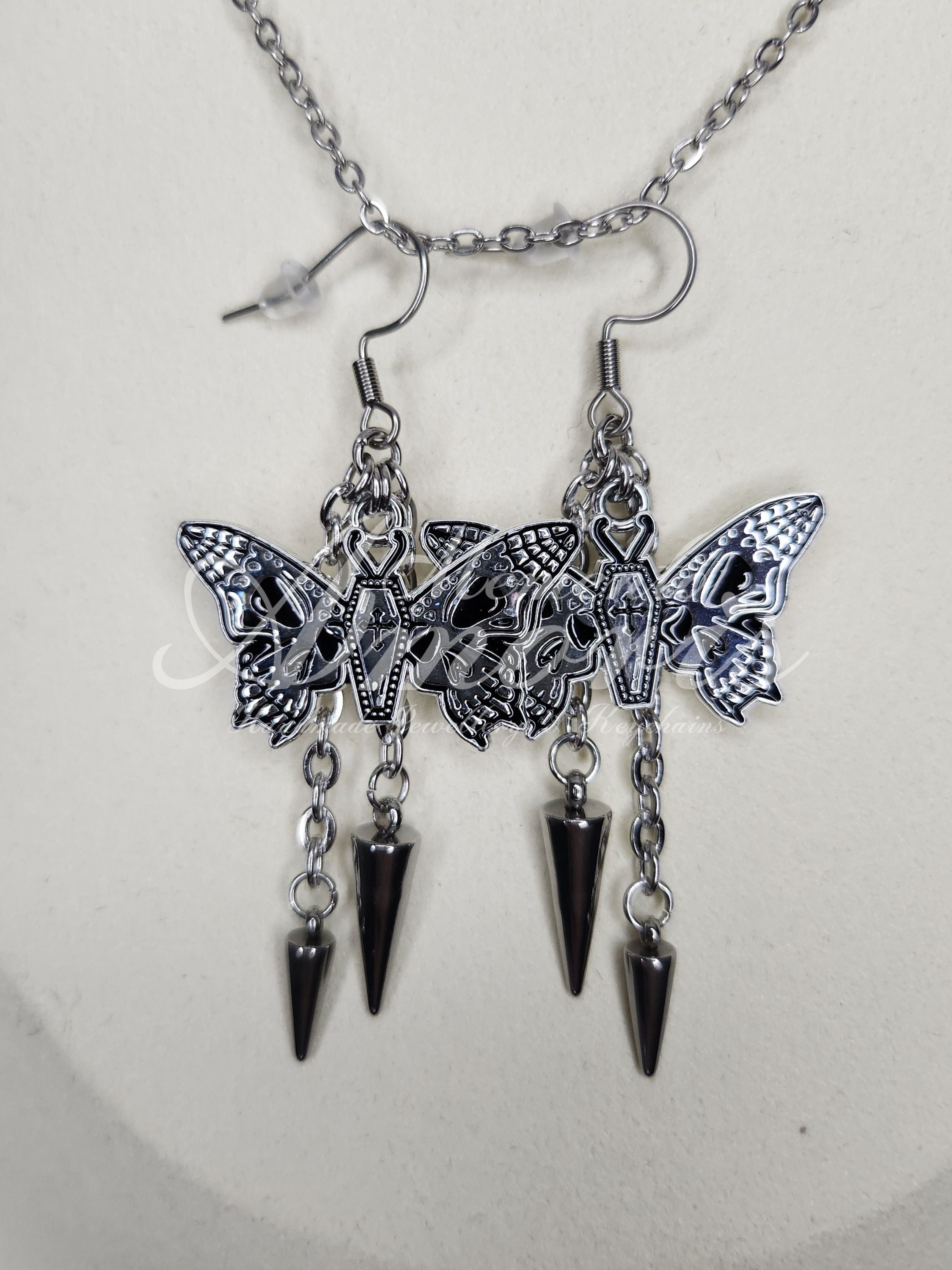 Spiked Coffin Butterfly Earrings in silver